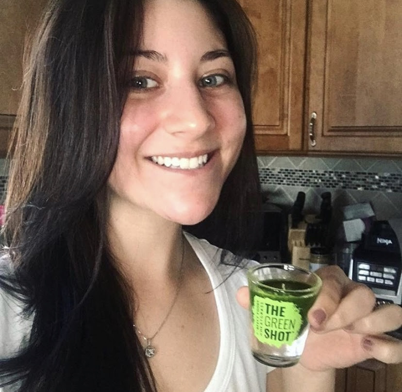 Girl with Wheatgrass shot